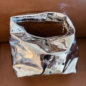 Huda Beauty Metallic Silver Shoulder Bag with Monogram Detail